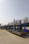 Fully Enclosed Russia Hydraulic Lifting 2/3 Axle Car Transport Trailer with
